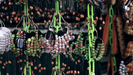 Close-up-to-handmade-bracelets-made-from-hemp-and-bamboo-sold-as-souvenirs-at-the-local-market-in-Dumaguete-Philippines