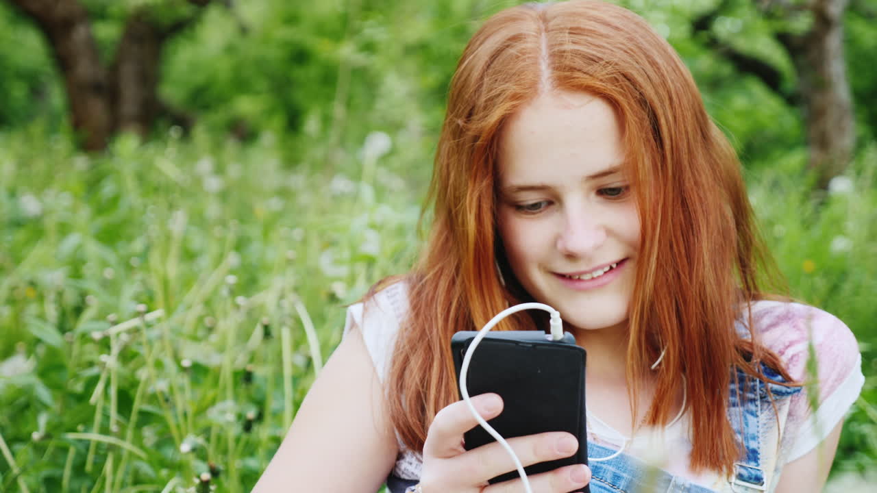 Smiling Teenage Girl Using The Phone 1