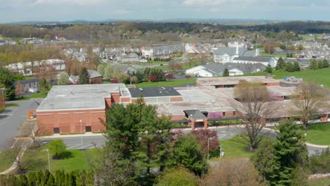 Exterior-aerial-of-large-red-brick-school-building