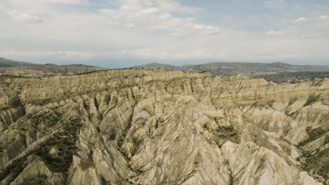 ragged sandstone rocky hill canyon in vashlovani steppes in georgia