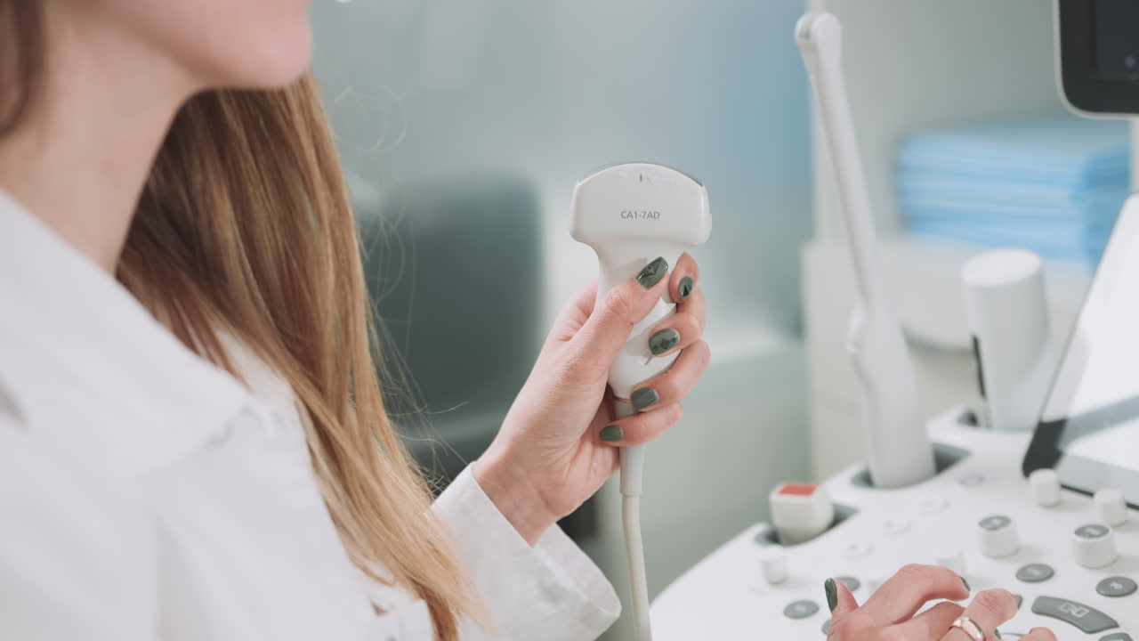 Doctor Performing Ultrasound Scan