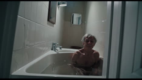 elderly man in a bathtub