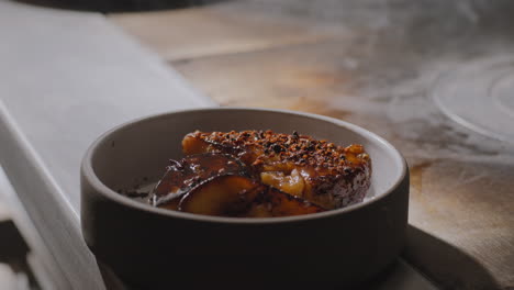 garnished plate of sweet potatoes ready to go out for service