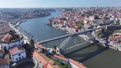 serra do pilar monastery at porto in porto district portugal. luis i bridge. ribeira pier. historical city scene. serra do pilar monastery at porto district in portugal. tourism landmarks
