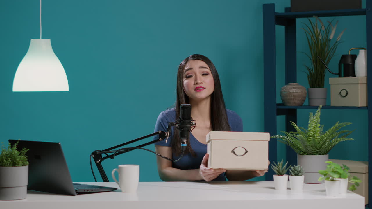 POV of content creator filming unboxing video with package order