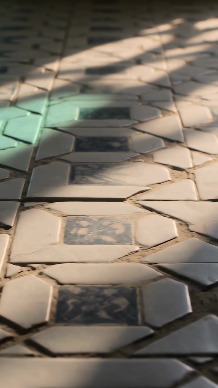 Vertical video: Panning cam over room tiles, green flash driving pan, showing blue insets, grout