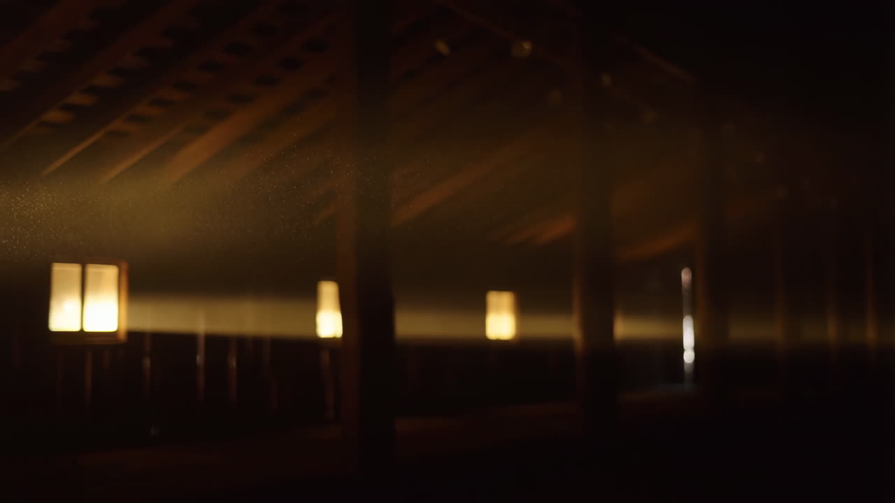 Light beams illuminating dust in a dark attic