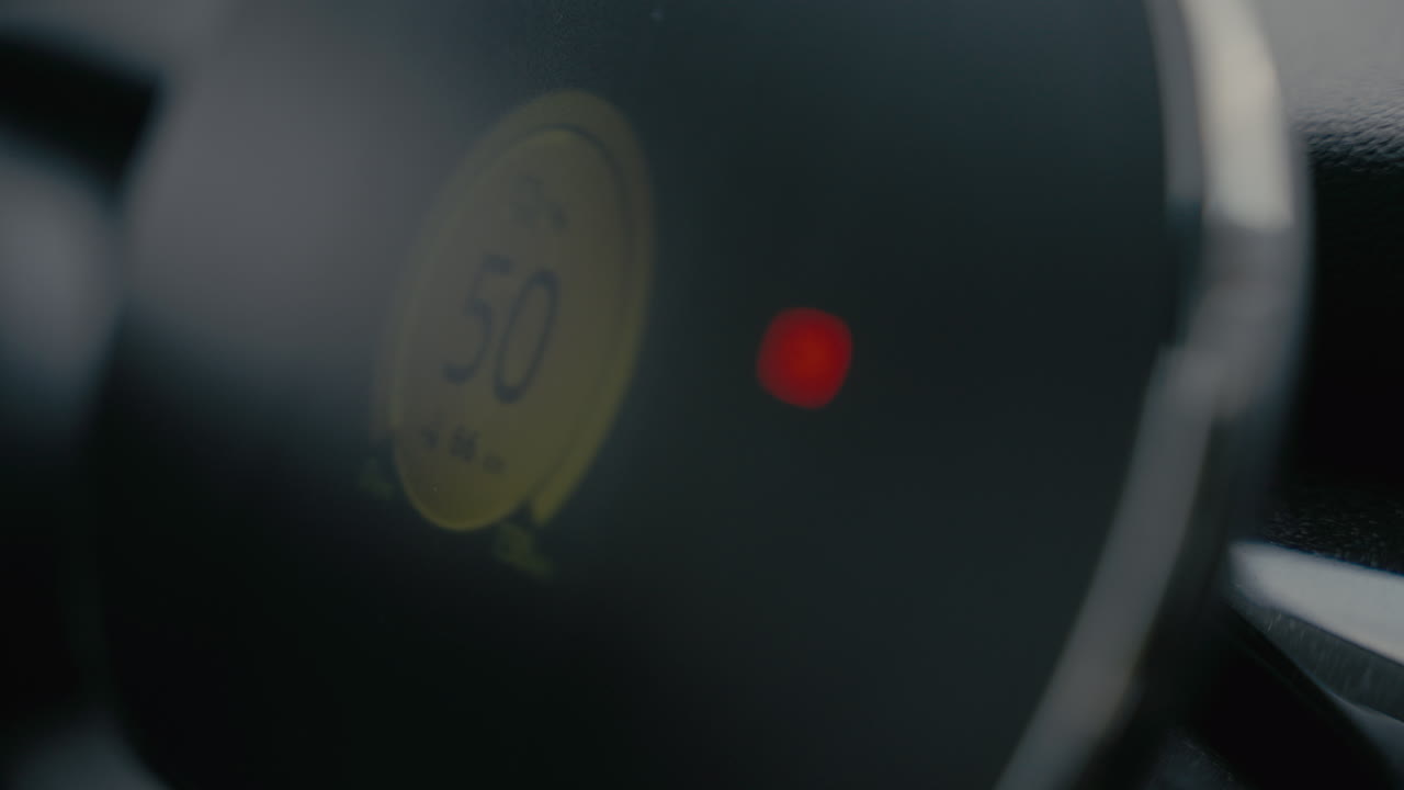 Car Dashboard Speedometer at 50 mph