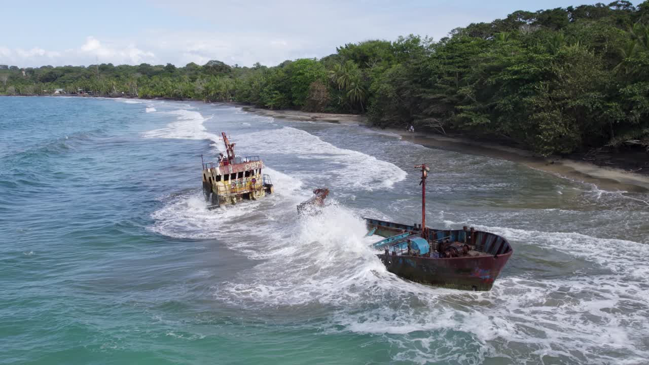 Aerial View of a Shipwreck on a Tropical Beach