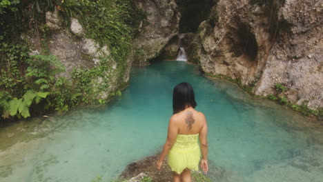 dominican woman enjoying the beautiful dr nature scene