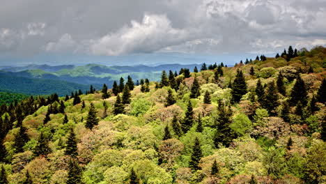 drone ascends over foggy ridges and rainy peaks deep in the smoky mountain wilds