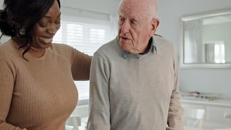 elderly man with caregiver at home