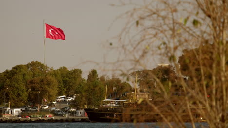 Long-clip-of-large-Turkish-flag-flying-in-stiff-breeze