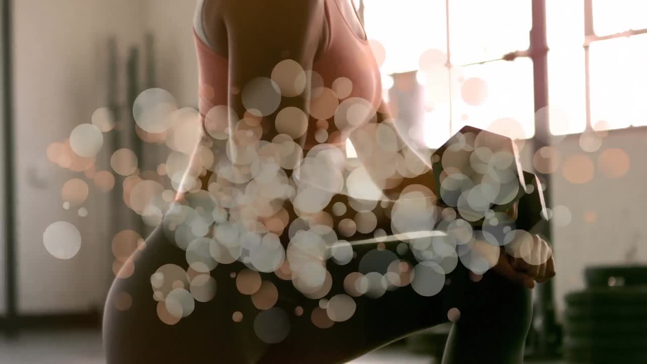 여자는 거품 효과로 둘러싸여 스포츠를 하고 있습니다.