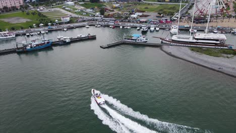 Aerial-shot-for-bouts-passing-through-in-the-black-sea-at-Batumi-coast-day-time-with-clear-sea-without-waves-Batumi-port