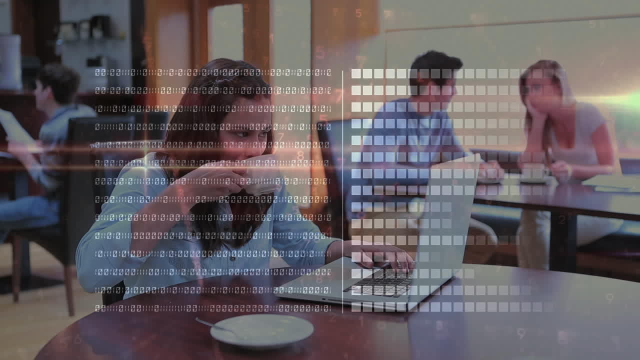 Animation of binary code and graph bars over caucasian woman drinking coffee and working on laptop