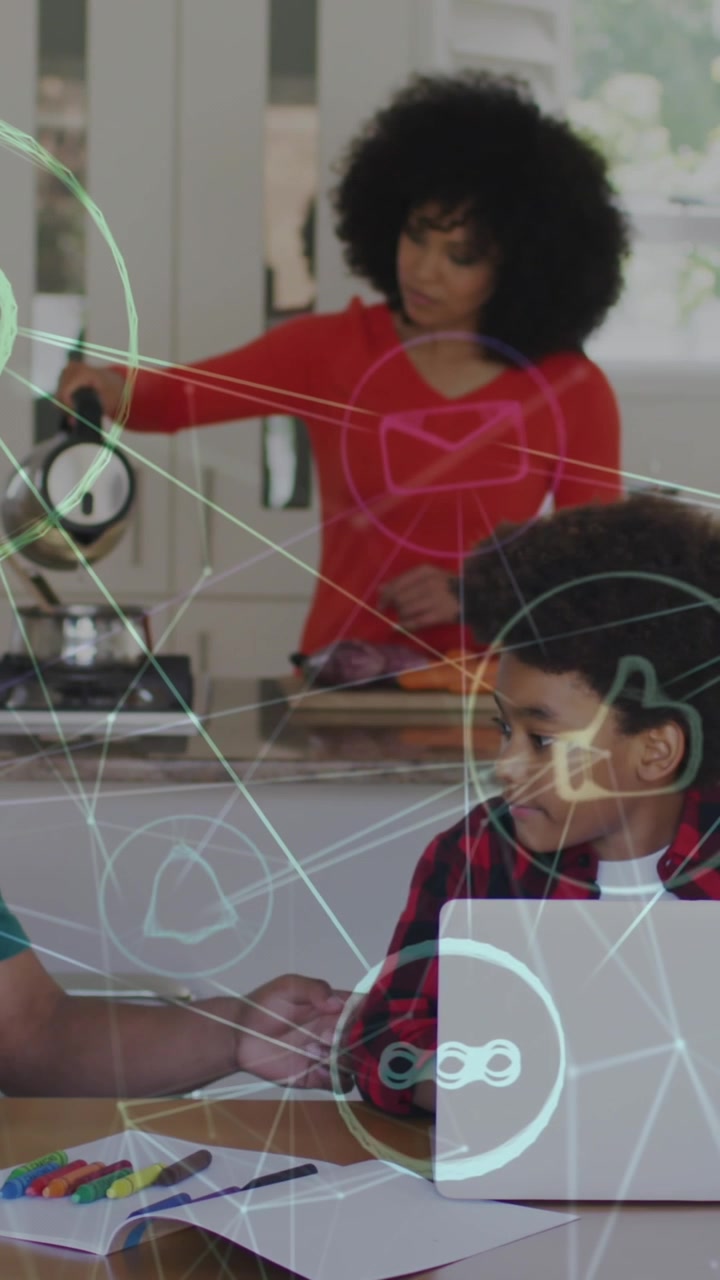 Animation of network of connections over man and son using laptops