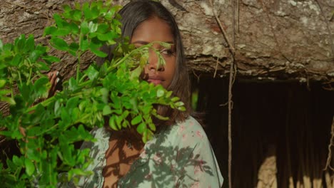 a curly-haired young girl spends a delightful day at a tropical park in trinidad close up