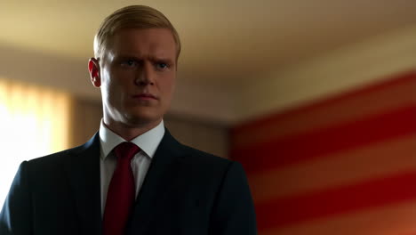 a man in a suit looking serious