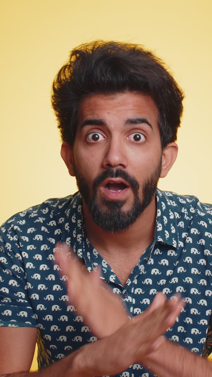 Indian man say no hold palm folded crossed hands in stop gesture warning of finish prohibited access