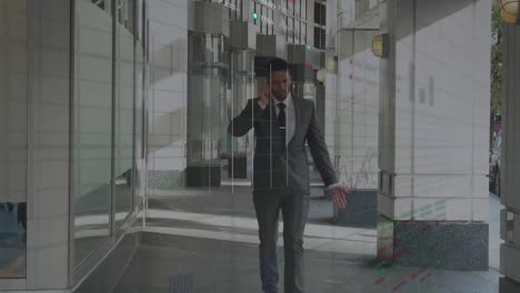 animation of stock market data processing over biracial businessman talking on smartphone at office