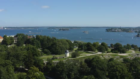 aerial helsinki finland waterfront park greenery and water clear sky