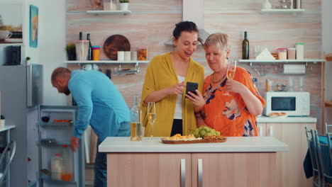 showing a funny movie on phone