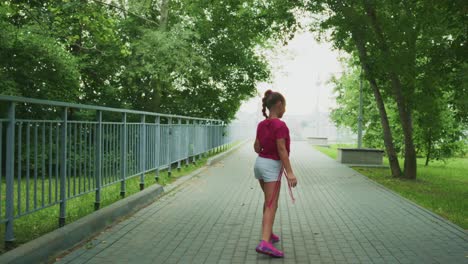 a young girl walking along a serene path swayed by nature's beauty, embarking on a journey of self-discovery with freedom in every step