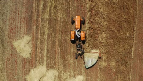 agricultural machines working in farmland during harvesting