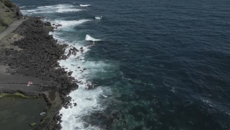 volcanic black coast and blue sea, sao miguel, azores islands