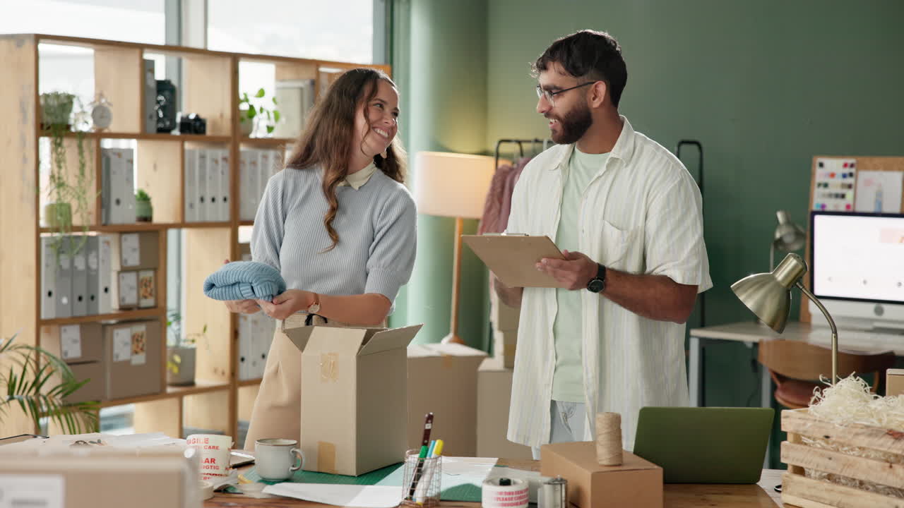 Team of entrepreneurs packing orders for their online store