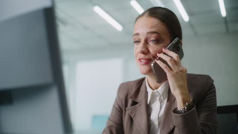 business woman on phone call in office