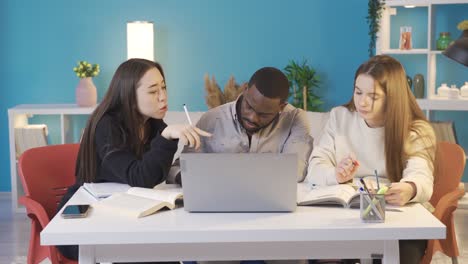 College-students-of-different-races-study-at-home.