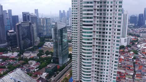 Residence-Apartment-Of-Denpasar-Rising-On-The-Cityscape-Of-Kuningan-City-In-Jakarta,-Indonesia