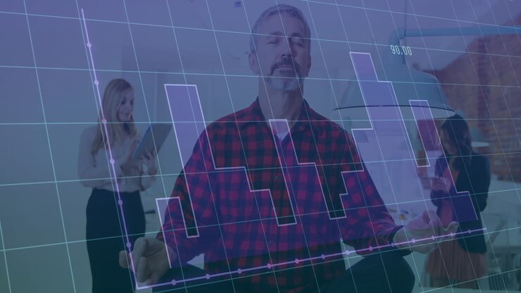 Meditating man with financial graph animation overlay in office environment