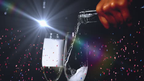 pouring champagne into glasses with confetti animation over dark background