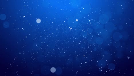 las partículas de bokeh azul brillantes premios gradiente de polvo fondo abstracto. brillantes futuristas en el espacio sobre fondo azul.