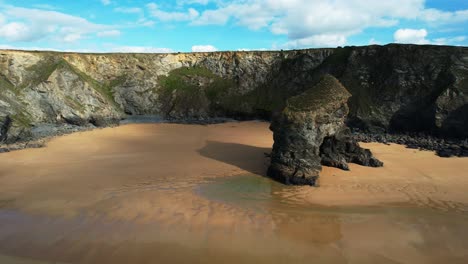 bedruthan steps from an aerial drone panning around with magnificent views of the cliffs