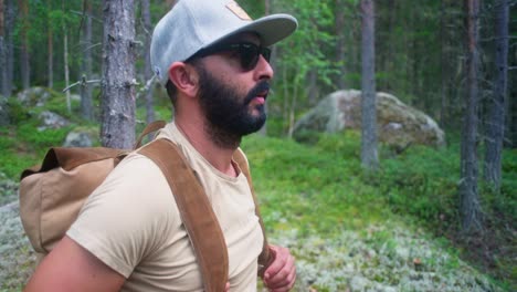 hiker standing in the woods