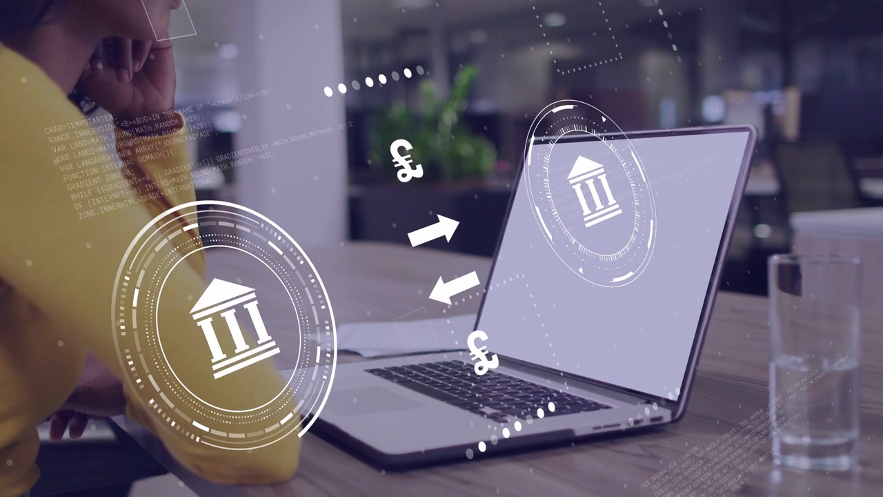 Woman resting chin and monitoring laptop in office, laptop receiving finance data, HUD showing €$¥£