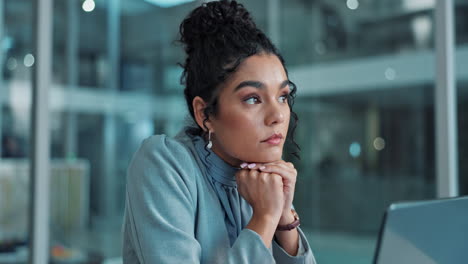 woman in business office thinking