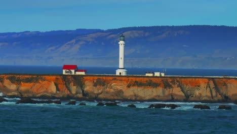 point arena historic landmark. museum lighthouse california aerial drone stoneboro manchester beach shoreline highway pacific ocean fort brag san francisco big sur daytime sunny waves upward jib mtn
