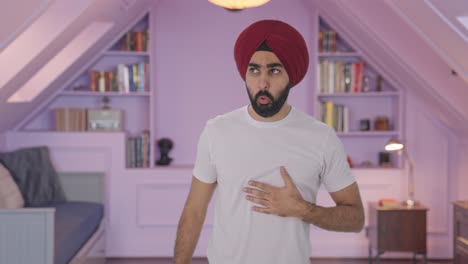 hombre indio sikh enfermo con un ataque de asma
