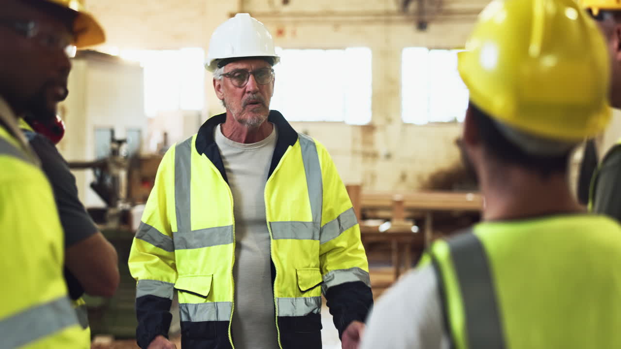 Construction workers in a warehouse setting