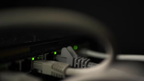 Ethernet-utp-cables-in-switch-close-up-panning-shot