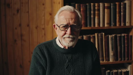 portrait of a thoughtful elderly man in a study