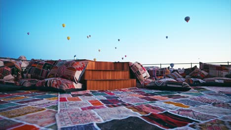 Hand-made-Turkish-carpets-placed-on-rooftop-terrace-in-Cappadocia