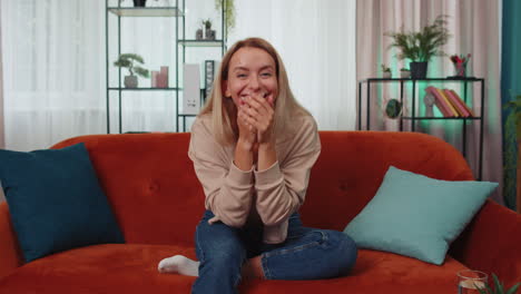excited young woman surprised, shocked by sudden victory, good win news, celebrating, wow reaction