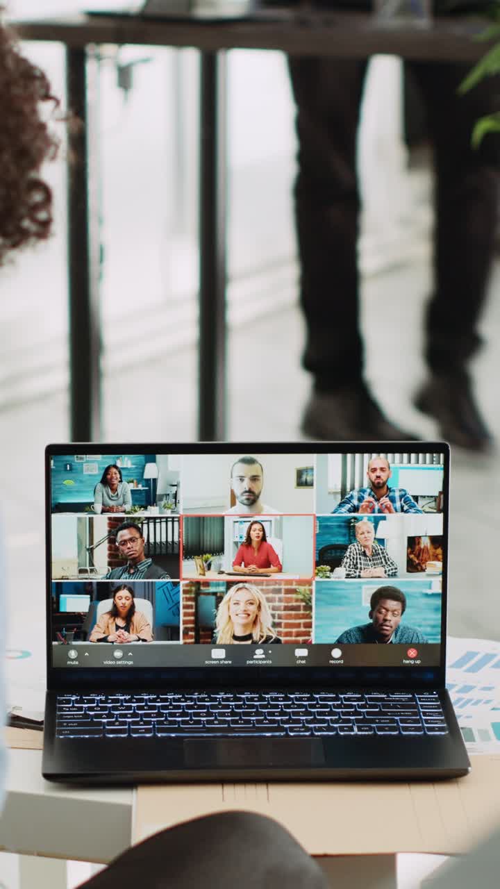 Vertical Video Analyst attends business meeting