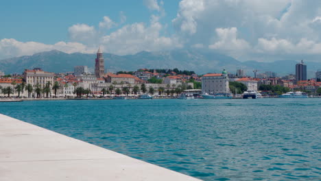 Split-promenade-with-palm-trees,-cathedral-and-cityscape